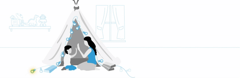 Mother and son playing in tent